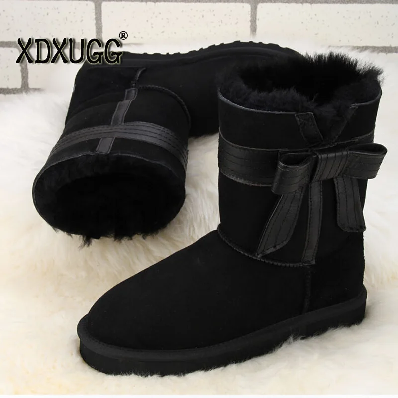 

Australian natural sheep fur snow boots female calf height winter Keep warm butterfly knot Flat heel boots,Free shipping