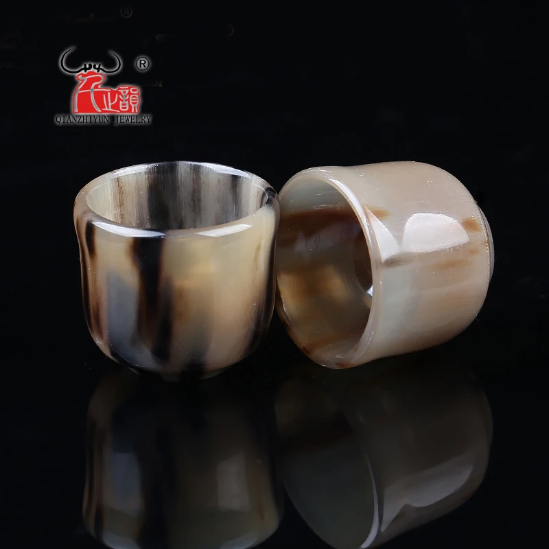 

Natural yak horn small wine cup with a bowl of horn craft.