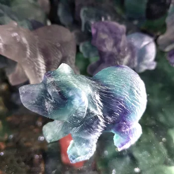 

Hand-carved bears of natural fluorite are used as home decoration
