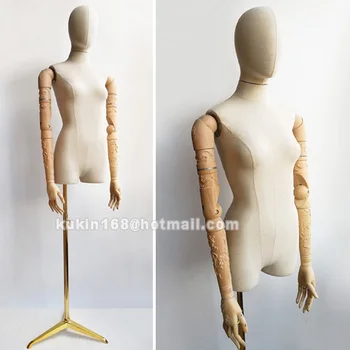 

Female mannequin with articulated wooden arms