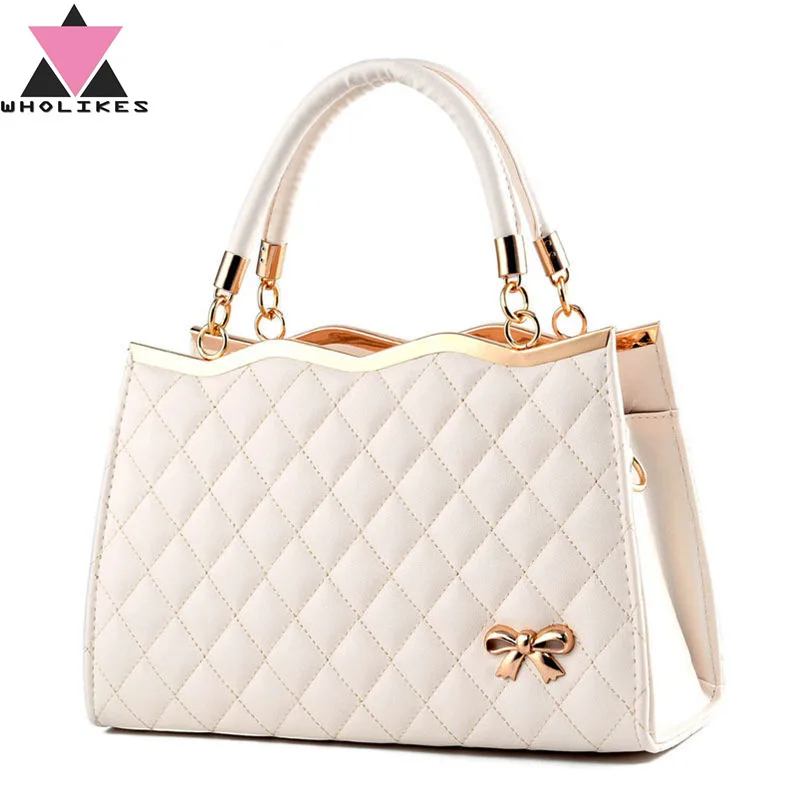 top handle beige bag