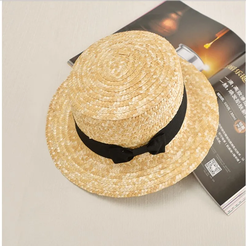 الصيف شقة قبعات للحماية من الشمس للنساء الفاتحة feminino سترو قبعة بنما نمط cappelli الجانب مع القوس دلو الشاطئ كاب فتاة topee الصيف شقة قبعات للحماية من الشمس للنساء الفاتحة feminino سترو قبعة بنما نمط cappelli الجانب مع القوس دلو الشاطئ كاب فتاة topee