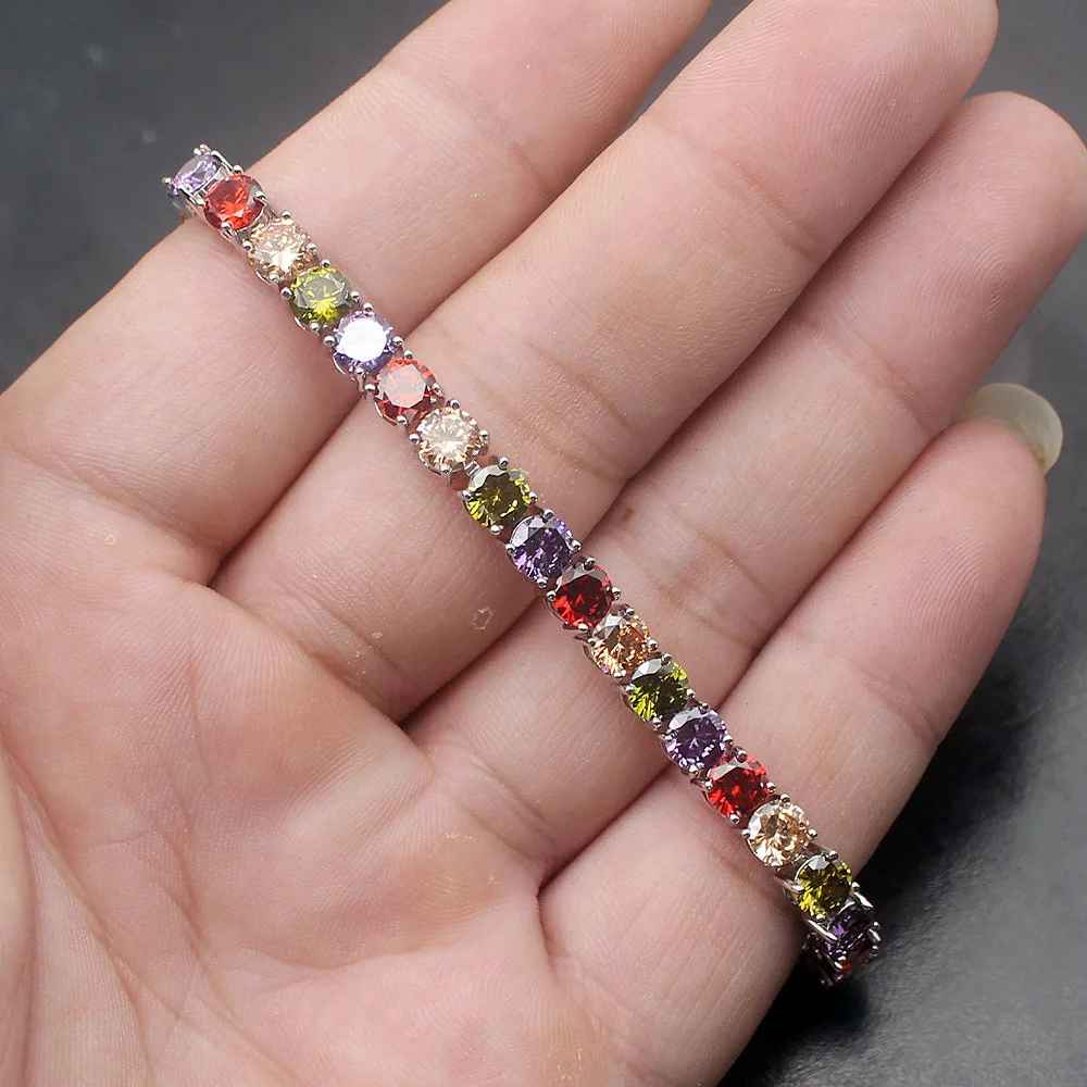 Женский браслет с разноцветными камнями Rainbow Peridot из серебра 925 пробы цепочками