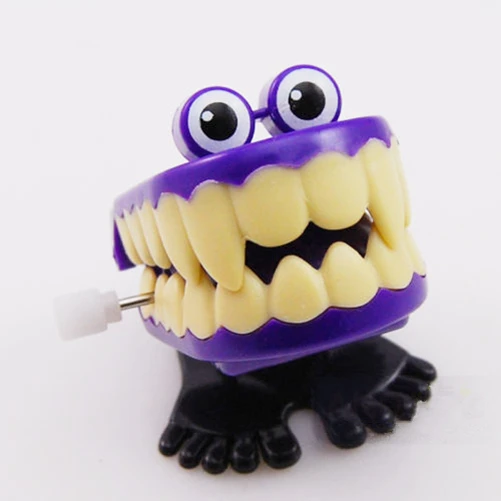 

20pcs / set Mixing Halloween ghost teeth on the chain jumping Easter dental model plastic Wind Up Toys children's toys