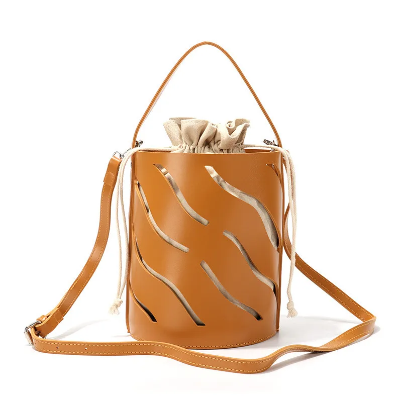 

Summer New Trend PU leather Hollow Bucket Bag With Drawstring bag Ladies Shoulder Crossbody Bags Personality Handbag Women