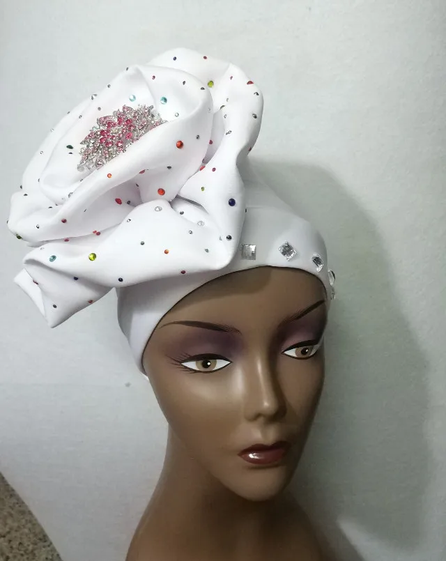 

Already made aso ebi headtie cap with stone and brooch