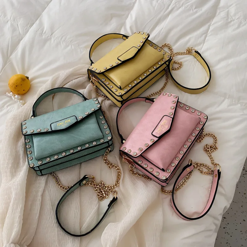 

Summer new small bag 2019 new fashion rivet small side pack wide range oblique satchel tote bags for women