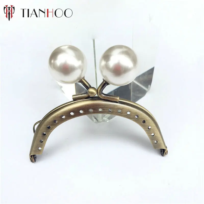 

TIANHOO 10pcs 7.5cm Metal Clasps for Purses Frame Replacement Handle for DIY Sewing Handbags Bag Parts Accessories Candy Bronze