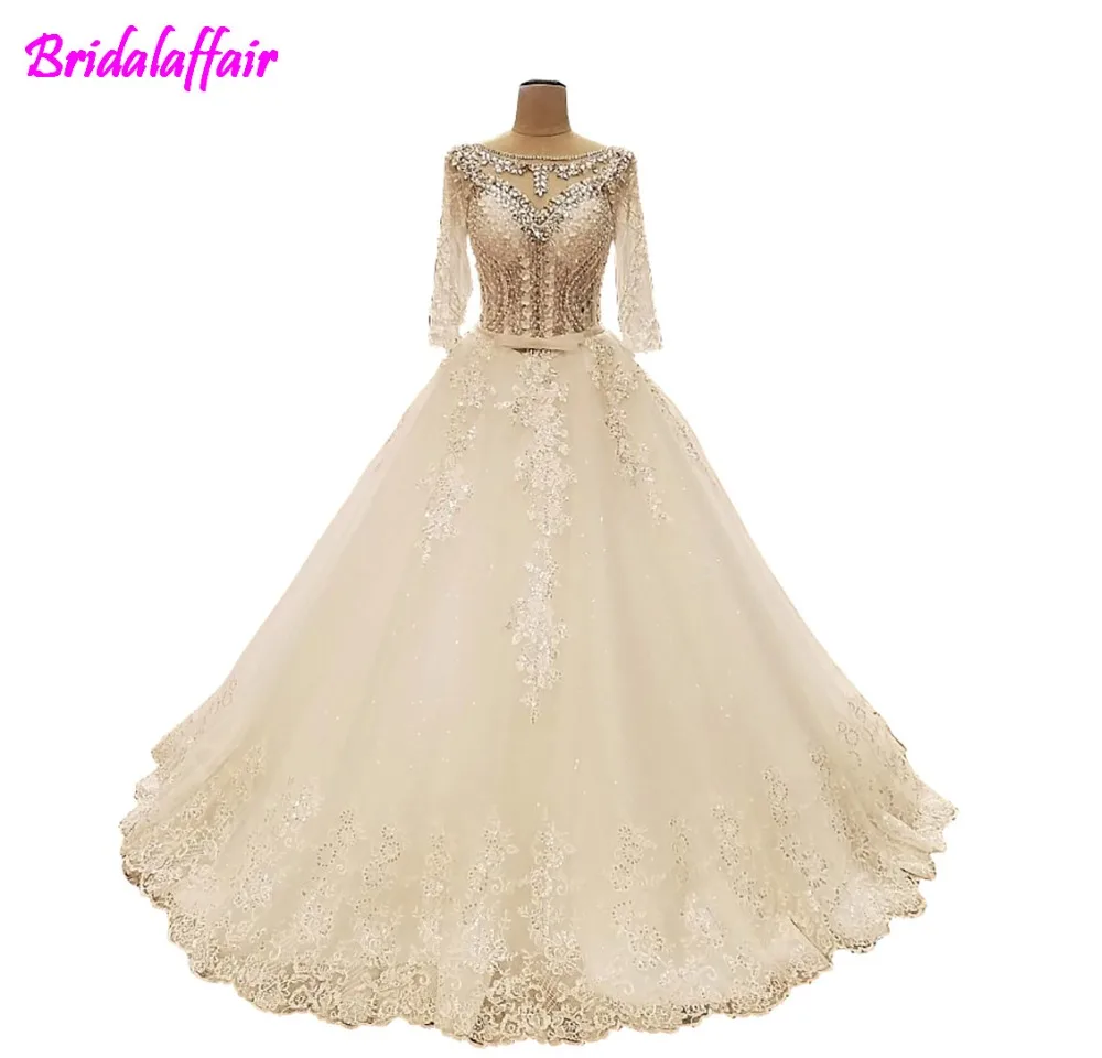 

Sexy Backless wed dress 2018 luxury brand marry dress princess short sleeves Romantic wedding dress court train Tull wed dress