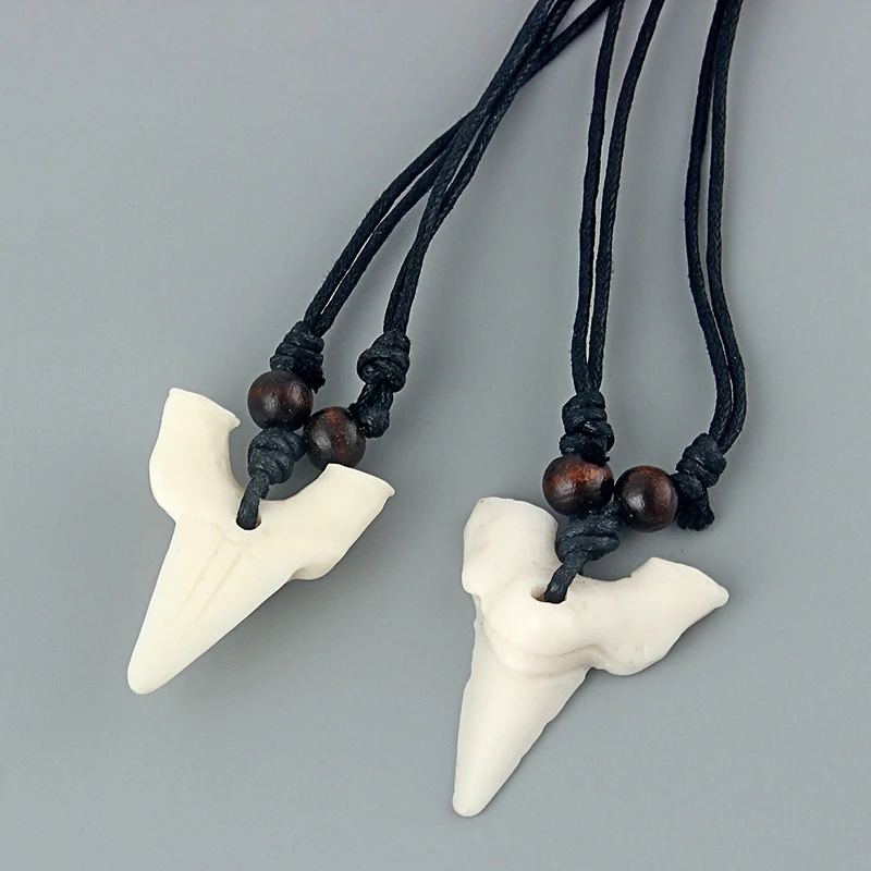 

Wholesale 12pcs White Shark Tooth Sharks Teeth Pendant Imitation Yak Bone Necklace Amulet Wax Cord Necklace Pendants