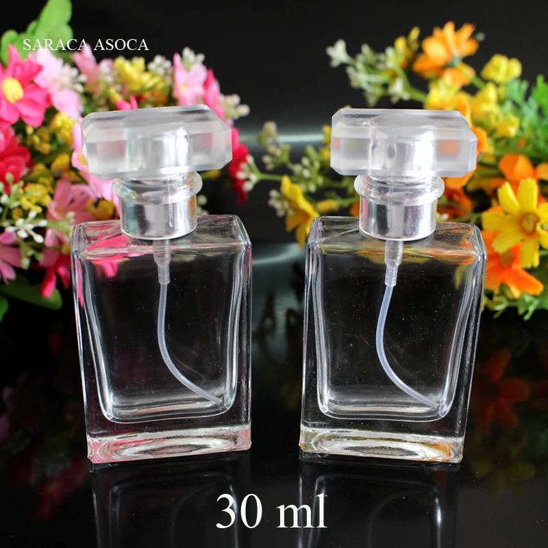 

Wholesale and Retail 30ml Perfume Cap Clear Glass Spray Refillable Perfume Bottles Glass Automizer Empty Cosmetic Container