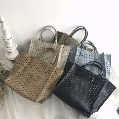 

2019 Fashion Saddle bag women Hollow out handbag solid color PU leather tote bag Summer seaside beach bag with larger capacity