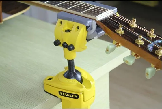 

Guitar repair head support, professional high-end head support, can be universal adjustment, not to hurt the neck