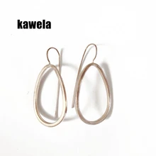 Милые филигранные серьги в форме капли