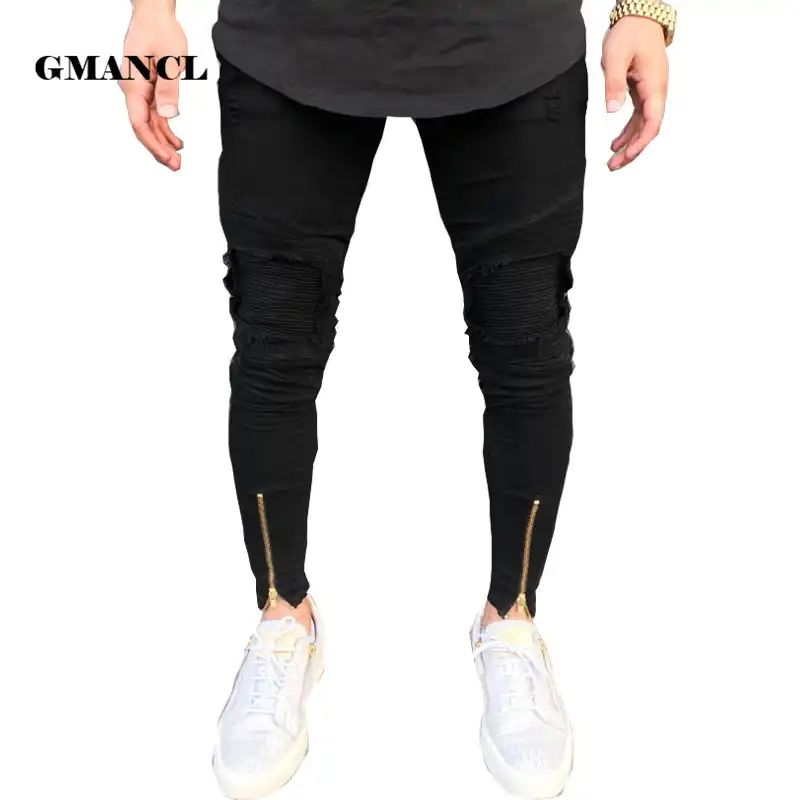 black jeans with zippers on bottom