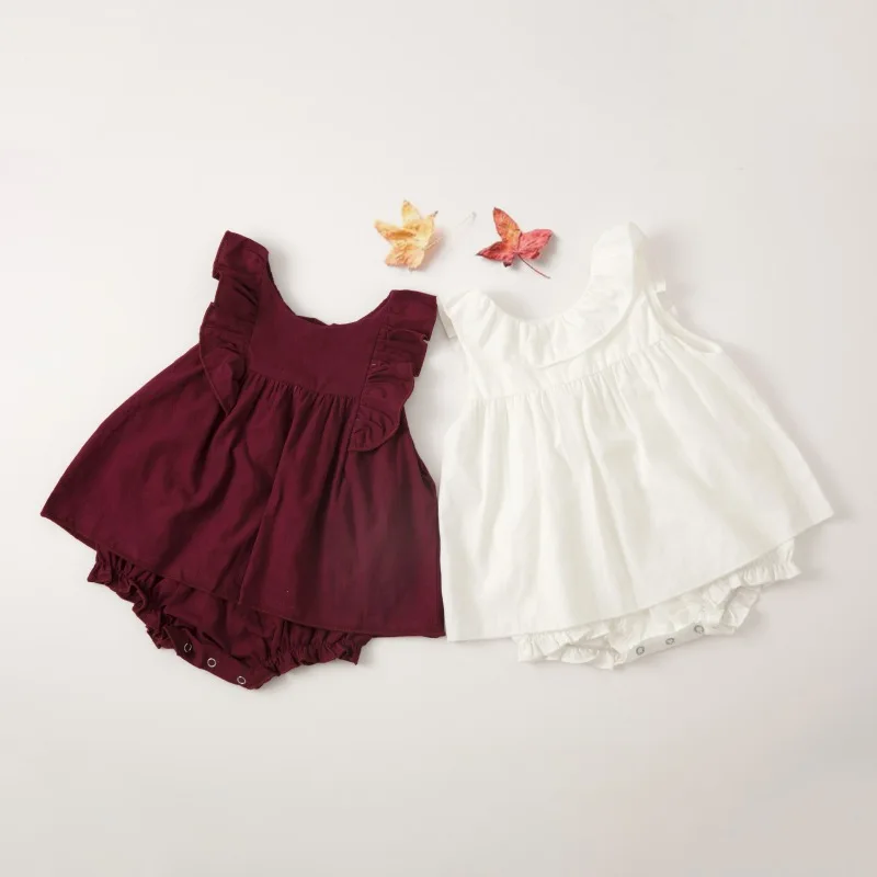 white jumpsuit red wine