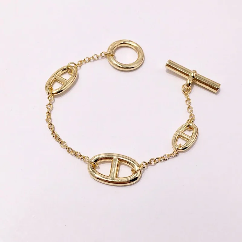 

High quality fashion copper plated glossy Japanese word OT buckle bracelet three colors