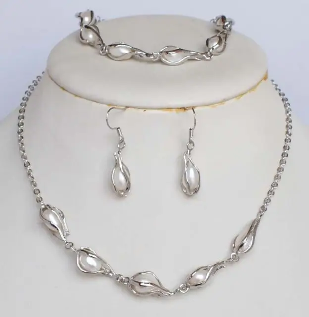 

Free shippingFashion 6-7mm freshwater pearl 18K Gold Plated bracelet earring necklace set