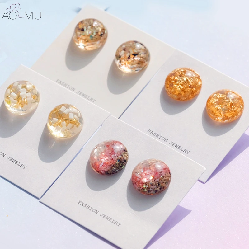 

AOMU Japan Korea Summer New Geometric Round Ball Transparent Three-dimensional Acrylic Earrings Acetic Acid Stud Earrings