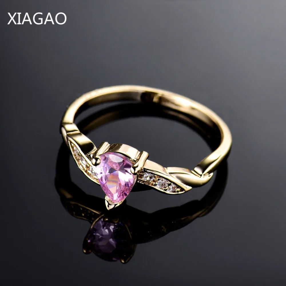 

XIAGAO 2017 Twist Rings for Women Gold Color Water Drop Pink Clear Crystal Wedding Engagement Finger Ring Female Bijoux XGR105