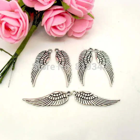 

Free Shipping 40pcs/lot 10x30mm Antique Silver Tone Tercel Wing Charm Pendants Findings J0441