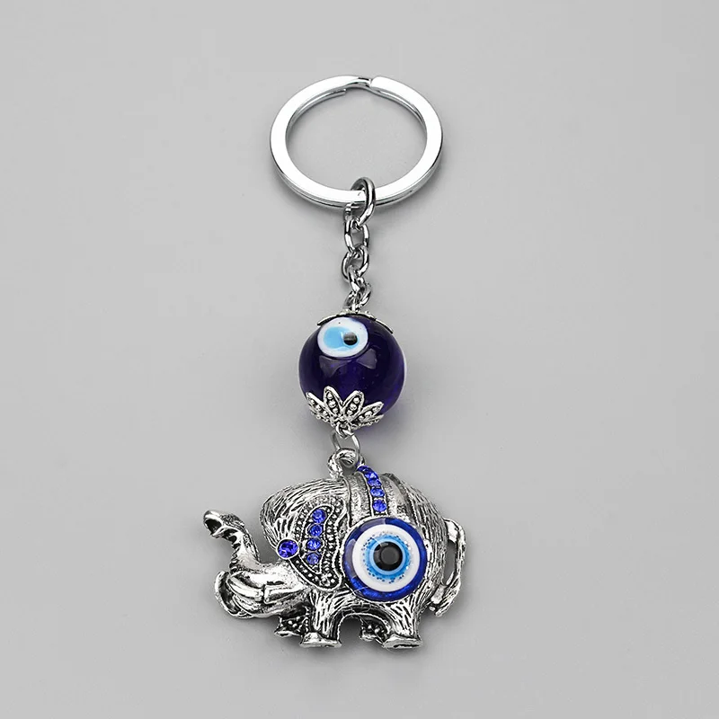 

EVIL EYE New Alloy Metal Antique Silver Evil Eye keychain Elephant Glass Pendant Protection Religion Keychain Keyring Vintage
