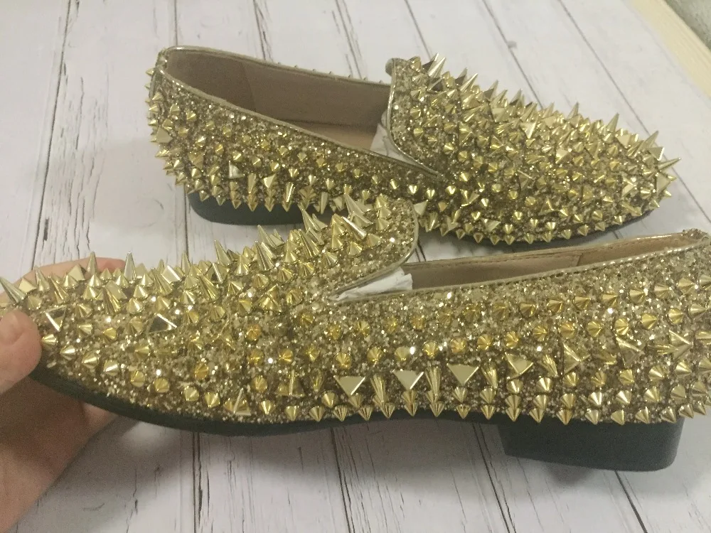 all gold spiked loafers