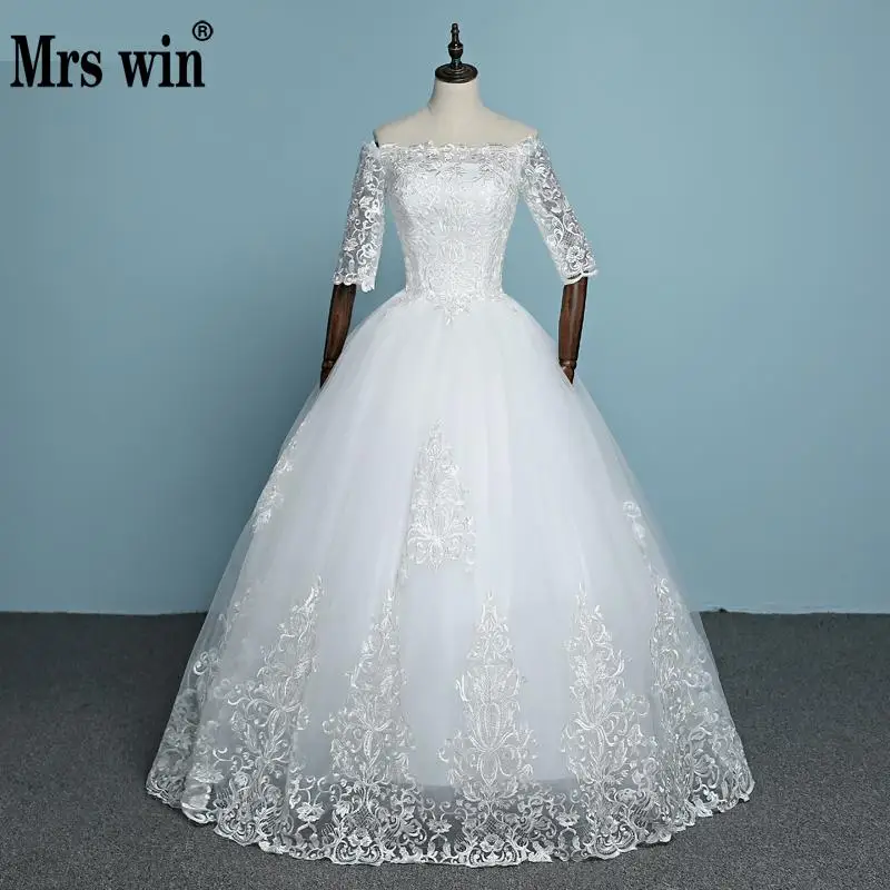 

2019 New Arrival Engerla Half Sleeve Lace Wedding Dress Boat Neck Bride Gown Lace Up Ball Gown Princess Simple Wedding Frock