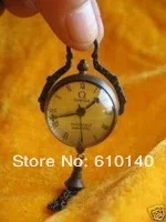 

Clock in bronze glass ball machine work rare