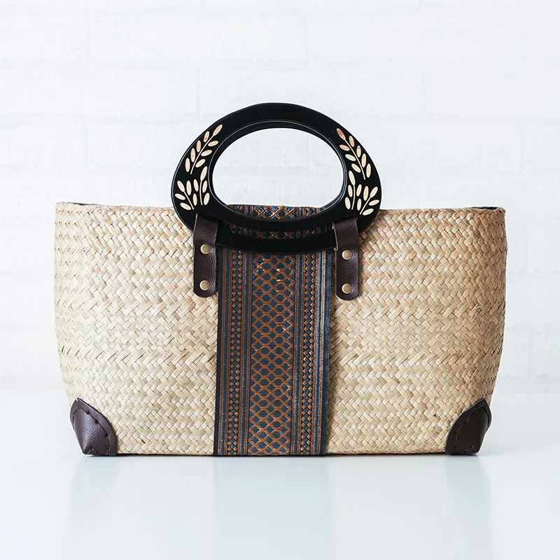 

Thai version of the straw bag handbag retro fashion women's rattan weaving beach package European and American style straw bag