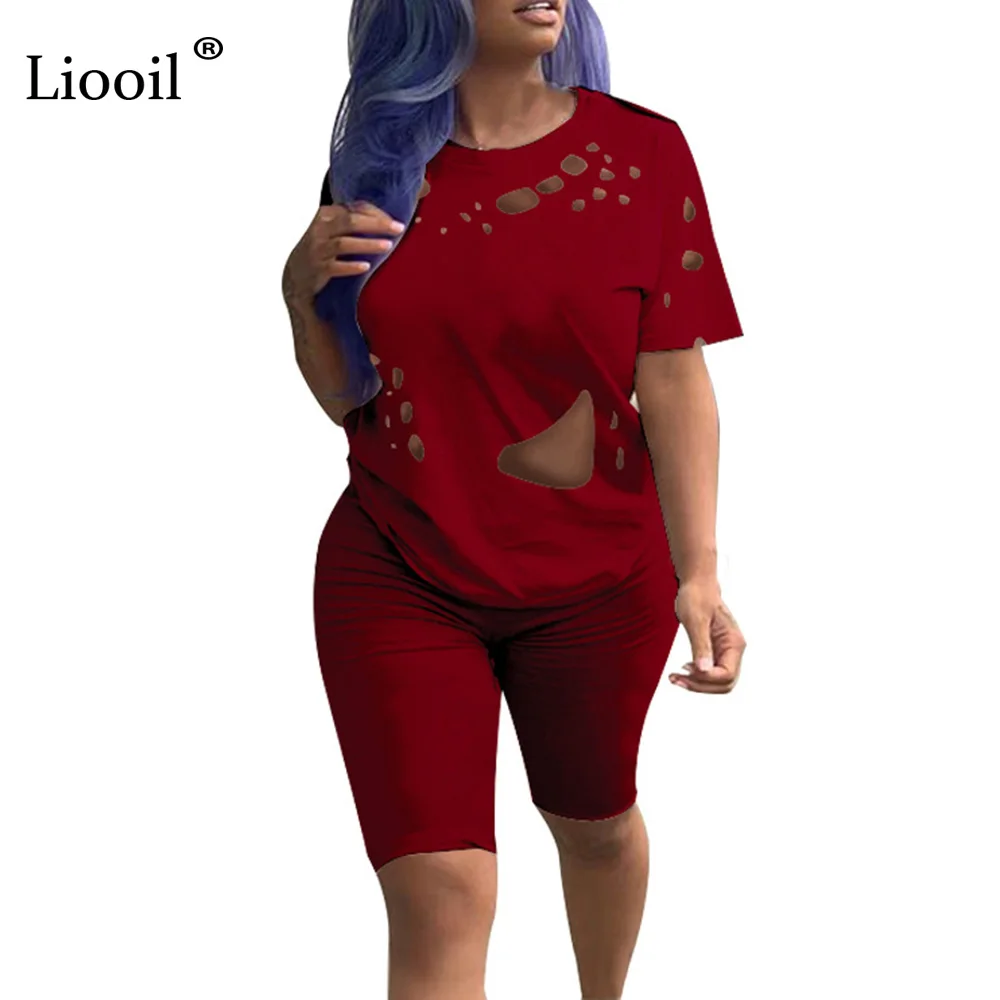 

Liooil Hole Two Piece Short Set 2019 Summer Outfit For Women Crop Top And Bodycon Biker Shorts Sporty Active Wear Track Suits