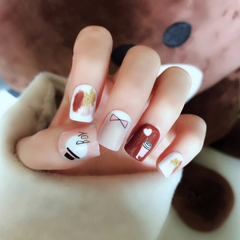 

Hot Sale 24 pcs/set Artificial Taro Fake Nails Press on Nails Short Natural Tips Full Cover False Nails with Rivets Designs