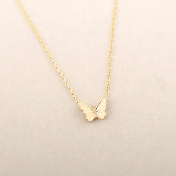 Gold Pink Gold Textured Butterfly Necklace.jpg
