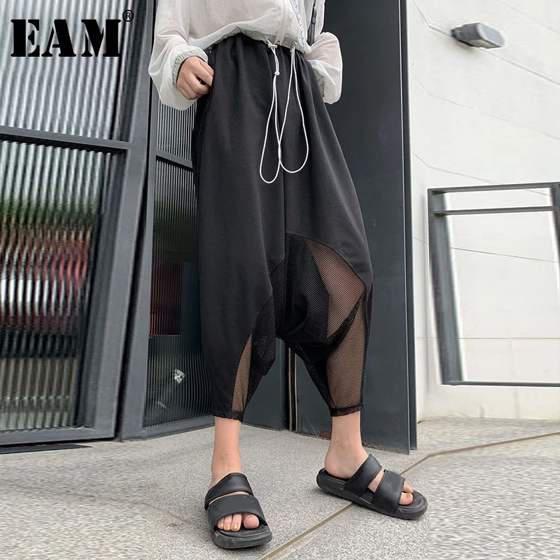 

[EAM] 2019 New Autumn Winter High Elastic Waist Loose Big Size Hollow Out Pockets Harem Pants Women Trousers Fashion Tide JY388