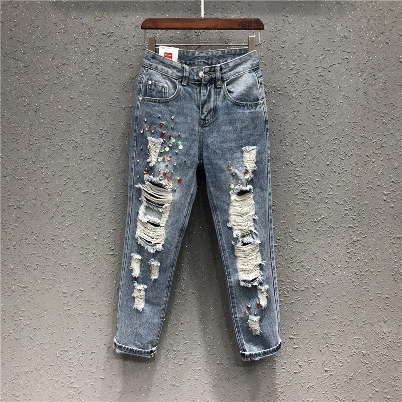 

2018 new high street women clothes lady fashion ankle length bleached ripped blue harem pants jeans