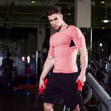 Спортивная одежда для мужчин s кожа плотный короткий рукав спортивный топ Бодибилдинг Фитнес Мужская компрессионная футболка спортивный тренажерный зал черная рубашка для бега