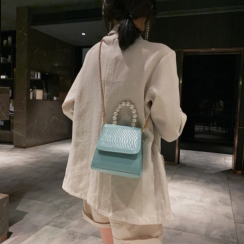 

2019 new women bags crossbody bags pu leather luxury designer handbags Stylish pearl hand bag with chain shoulder