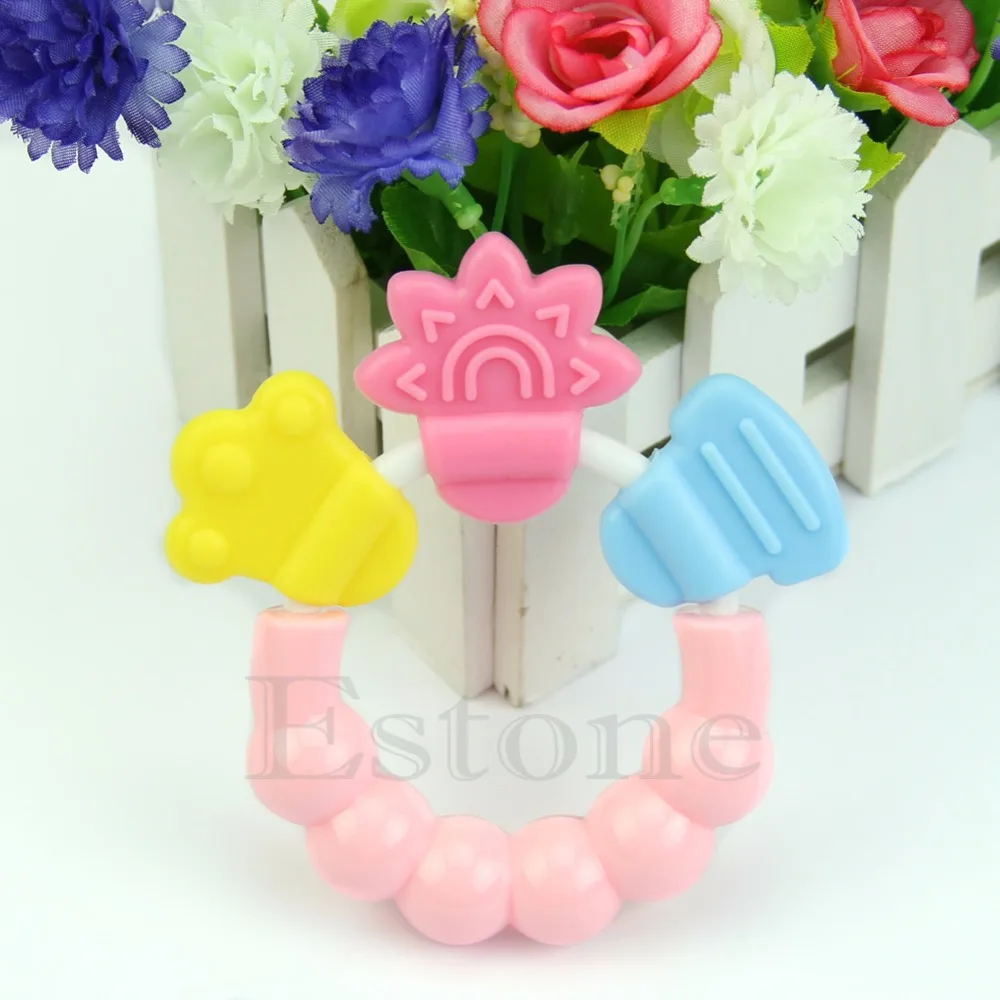 Baby Kid Toddler Teether Chew Toy Molar Rod Silicone Handbell Jingle