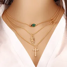 2018Fashion eye leaves simple multi-layer metal clothing accessories cross collarbone chain.