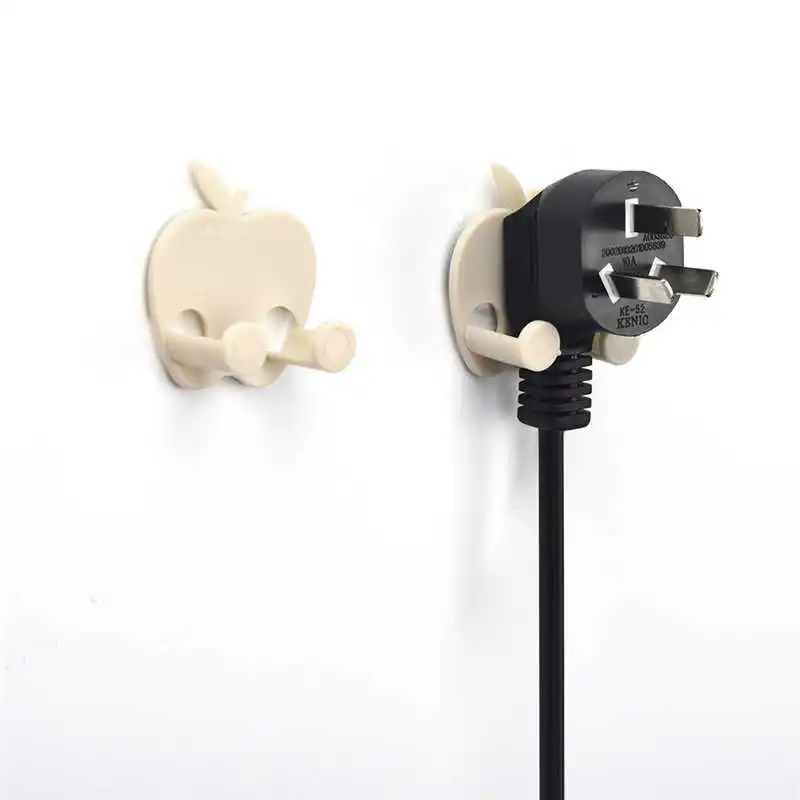 

Novel Pollution-free socket Storage Rack Creative Gluing Wall Outlet Power Cord Storage Rack Plug Finishing Rack Kitchen Tool