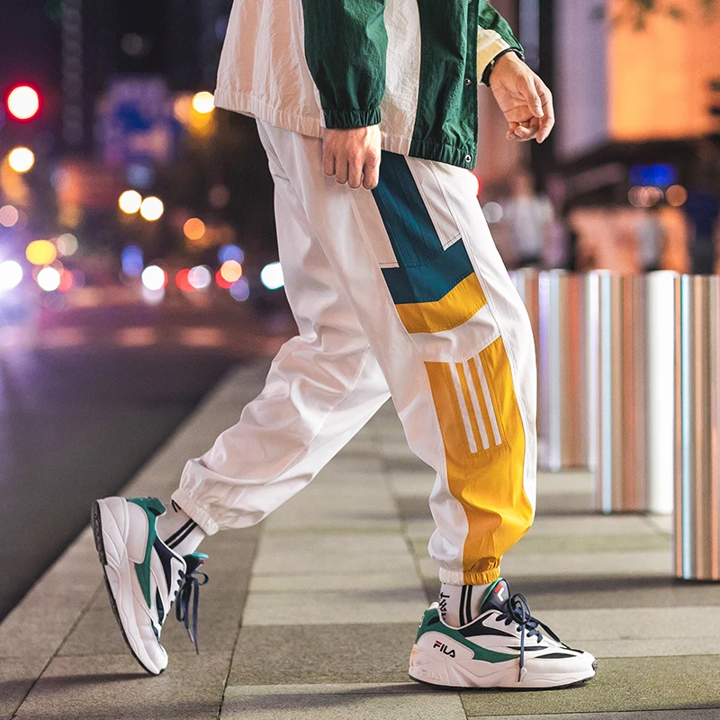ركض Sweatpants الرجال عارضة سروال مخطط الأزياء فضفاض السراويل الترنك الرجال عرق السراويل الرياضية اليابانية الشارع الشهير الأبيض الأسود