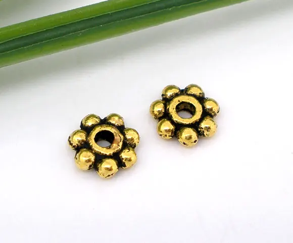 

DoreenBeads Zinc metal alloy Spacer Beads Flower golden Tone color About 5mm(2/8")x 5mm(2/8"),Hole:Approx 0.8mm,50 PCs