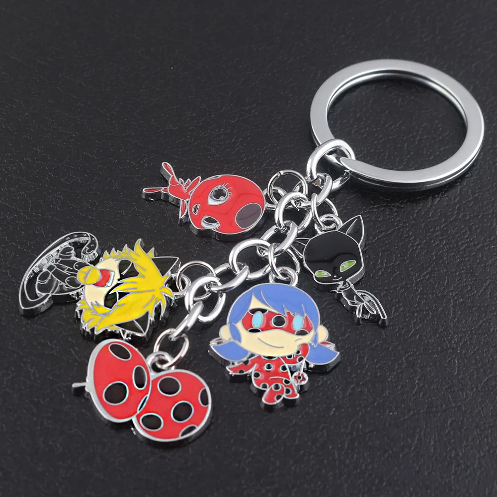 

SG New Anime Miraculous Ladybug Cute Anime Figures Ladybug Cat Noir Keychain Star Wars Cosplay Key Chains Charms Kids Boys Gift