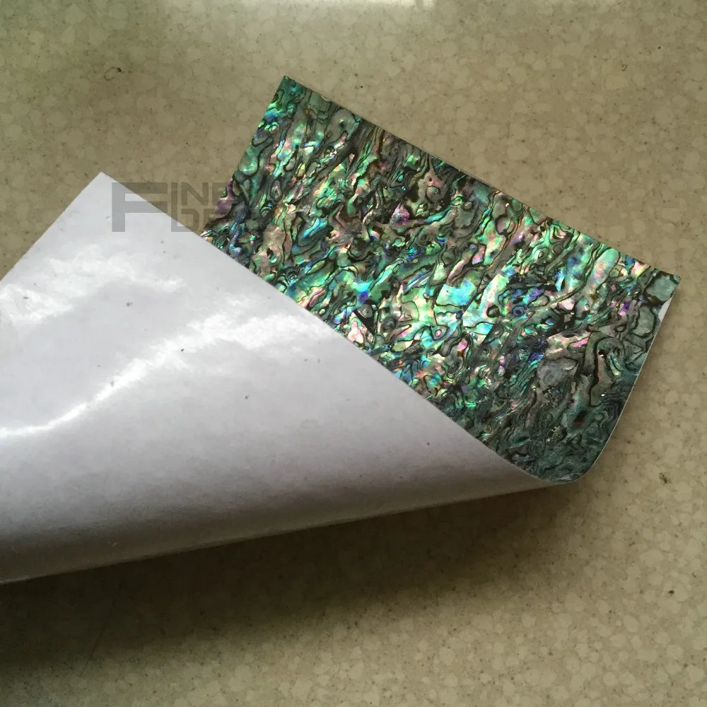

AAA Grade New Zealand paua shell laminate with self-adhesive sticker backing for musical instrument inlay
