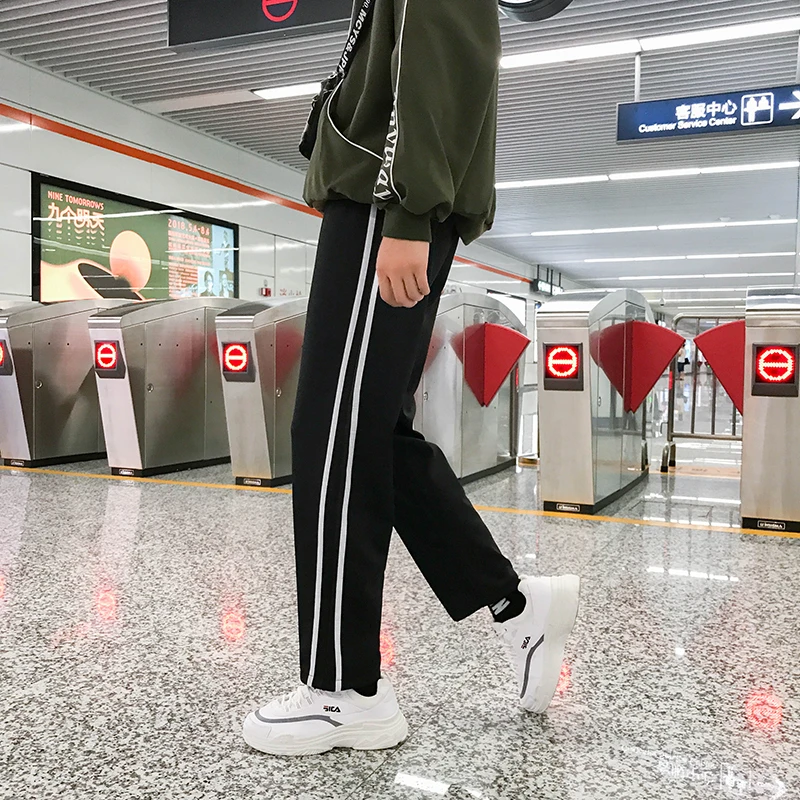 Fashion Casual Men's Sweatpants Spring And Autumn New M-XL Webbing Loose Nine Pants Three Colors Personality Youth Popular