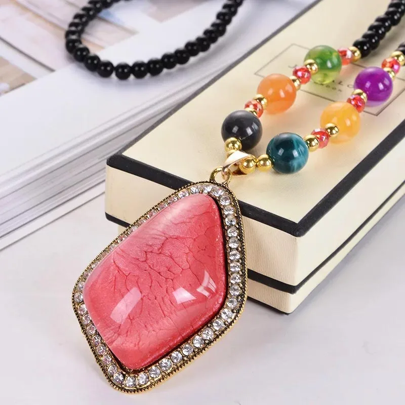 

Long sweater chain necklace ladies fashionable and elegant color long imitation gemstone edge pendant pendant accessories