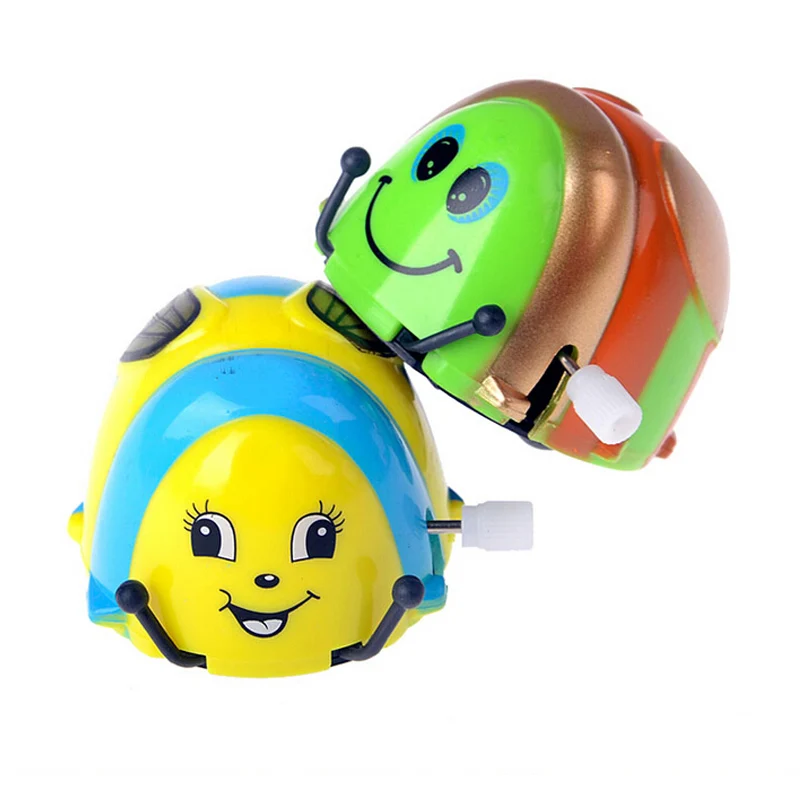 

1pc Random Clockwork Beetle Toy 2017 Funny Cartoon Animal Type Kids Baby Toys Small Chain Beetle Dump on the Chain