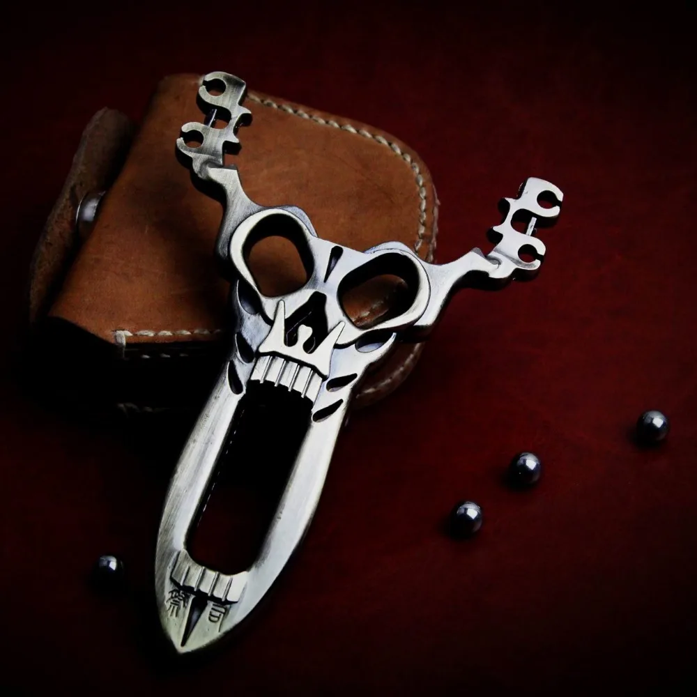 

Cool! Skull Design Skull Design Pocket Alloy Powerful Hunting Catapult Slingshot+Geninue Leather Steel Ball Ammo Pouch Bag