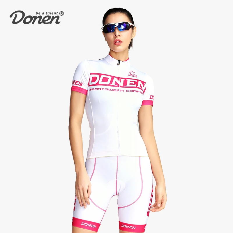 DONEN 2019 جديد الدراجات النساء الوردي قصيرة الأكمام جيرسي مريلة السراويل Paded الدراجة سباق فريق الطريق السائق الدراجات الرياضية دعوى /مجموعة