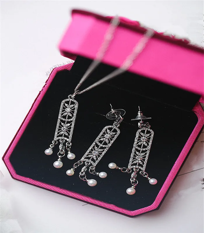 

Fashion Imitation Fine Hollow Shield Tassel Rhinestone Pearl Jewelry Long Stud Metal Crystal Necklace